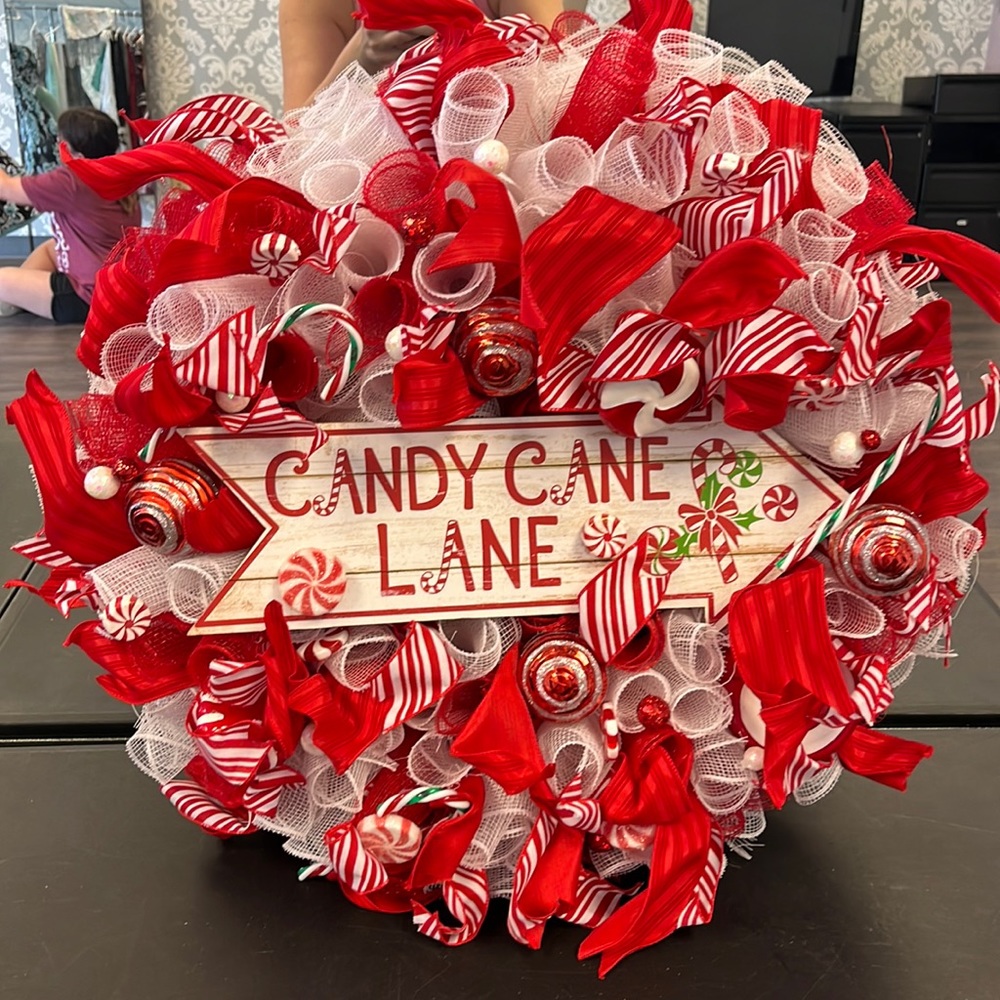 22” Candy Cane Lane Christmas Wreath Used Good Condition.  Organza red/white